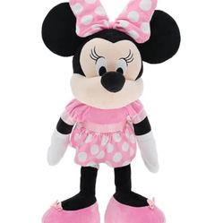 Original Disney Minnie Mouse plush toy in a lovely pink color with a polka dot dress and white gloves. Soft, lightweight,