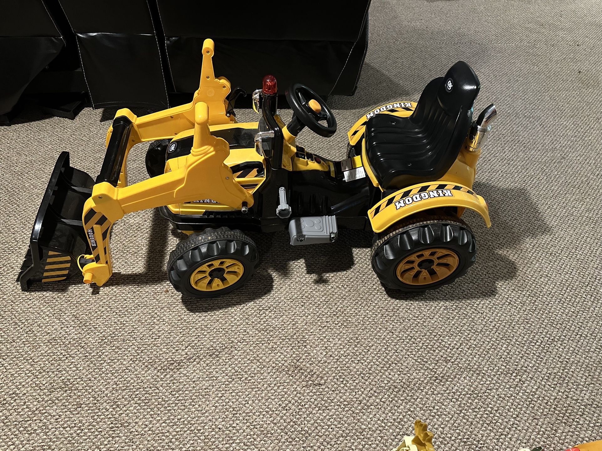 Kids ride on excavator