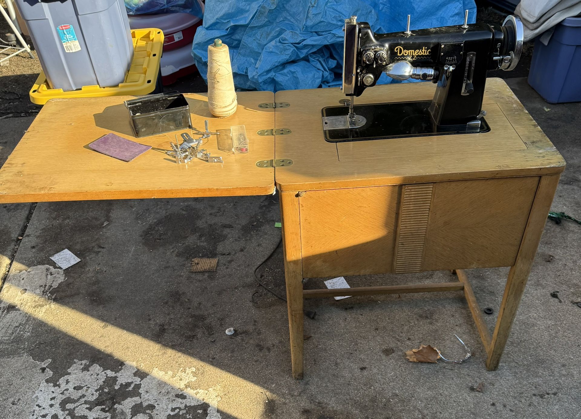 Domestic Z.Z sewing machine works well, some stains on the wood but otherwise fine