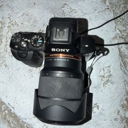     Sony A7 Camera Bundle w/ Lens, Flash & Batteries