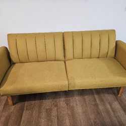 Used Mustard color futon. 