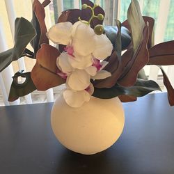 Artificial plant and vase