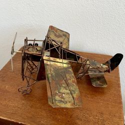 vintage metal airplane music box