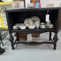 Antique black cabinet with shelf inside