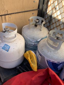 Three empty propane tanks available for sale bbq grill Asador