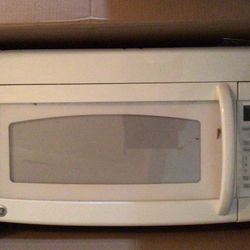 GE Microwave Oven. Over The Stove.