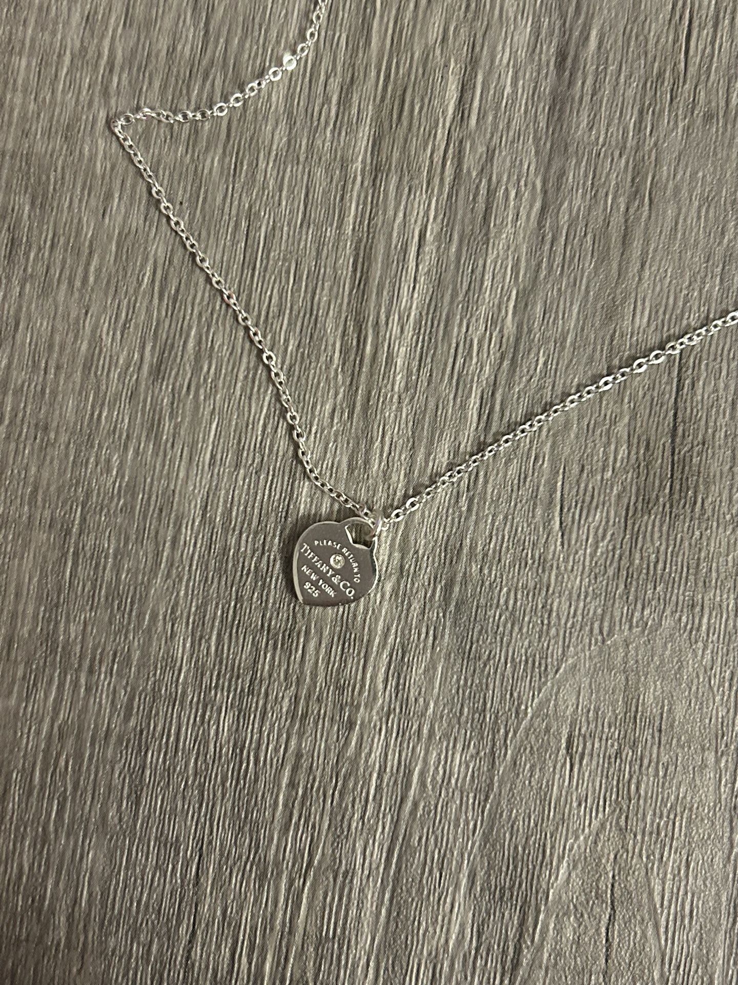 Tiffany & Co. Mini Silver Heart Necklace with Diamond