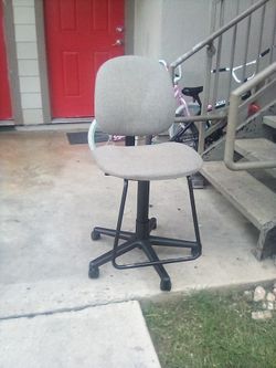 A chair and a girls bike
