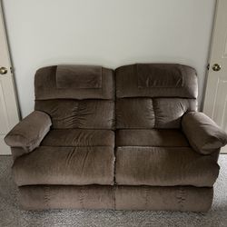 Tan Reclining Loveseat 