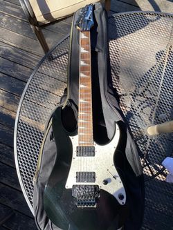 Ibanez Guitar, Line 6 Amp, and Pedalboard Combo