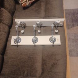 2 Sets of Towel Hooks on White Boards