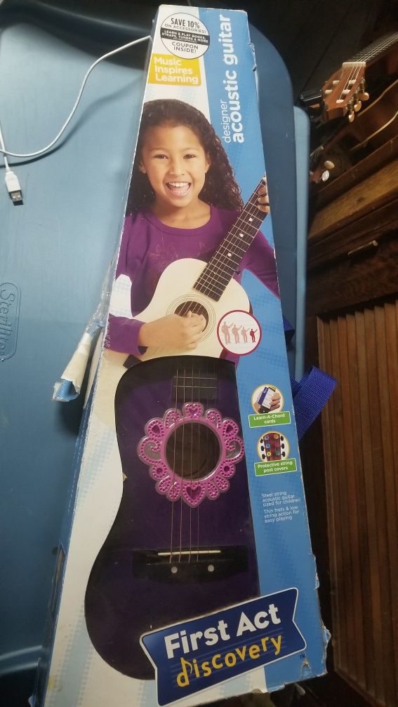 Girls child purple guitar acoustic