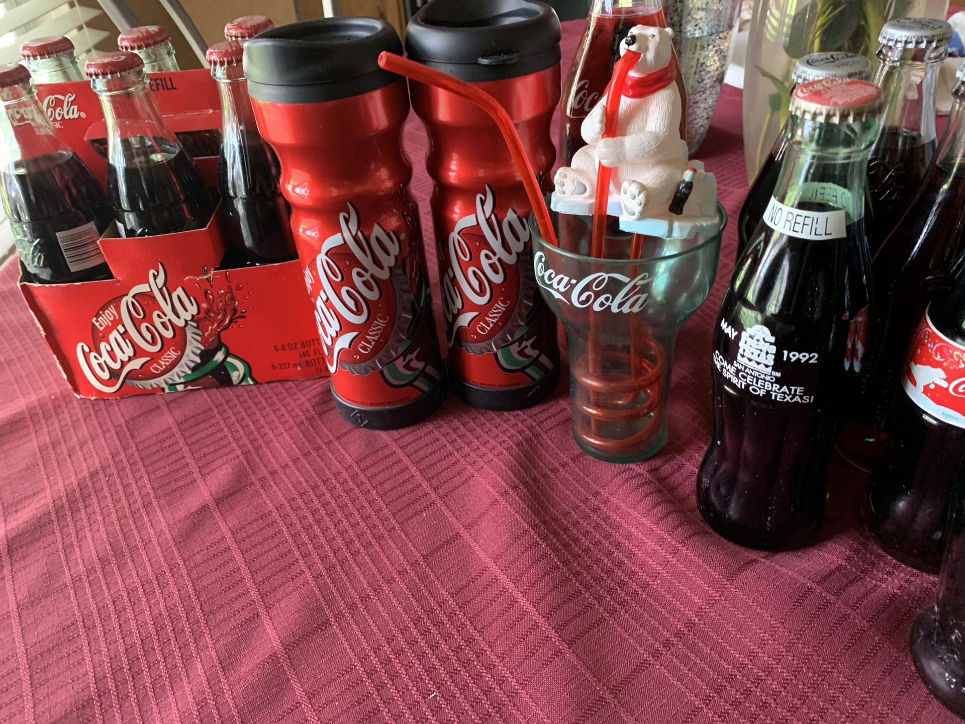 Coca Cola Antique bottles and cups