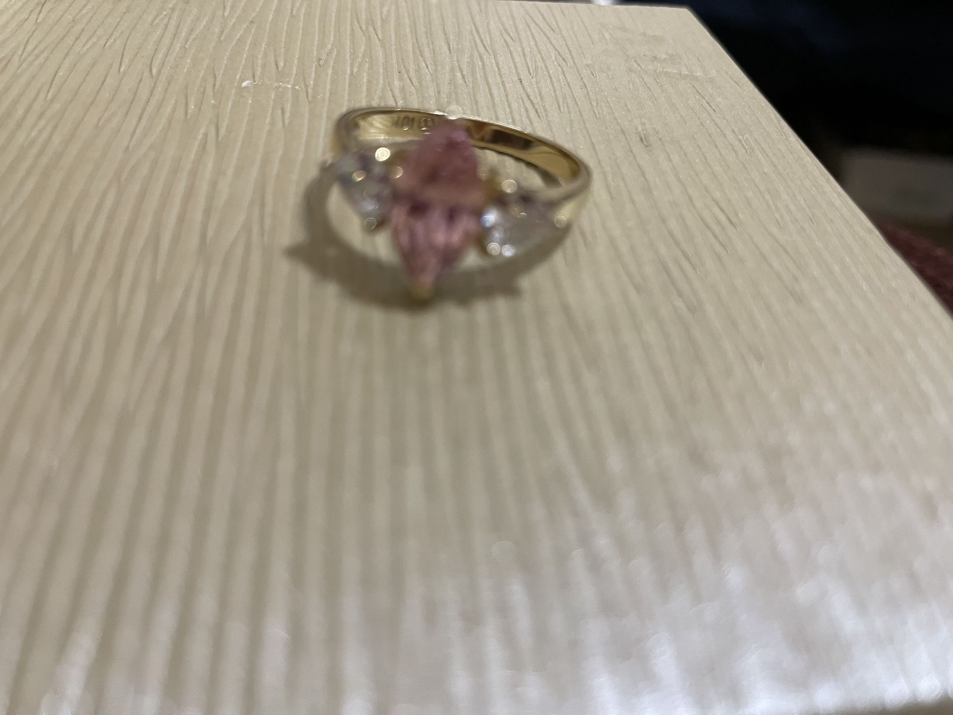 Marquise Cut Pink Ice Stone With Cubic Stones On Either Side In A Gold Tone Setting Size 8