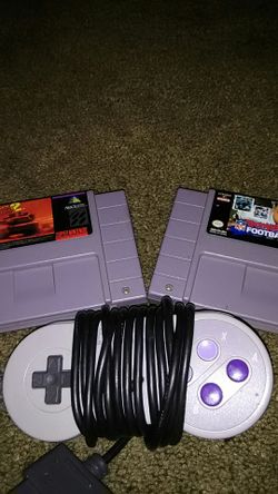 Super Nintendo controller and 2 games