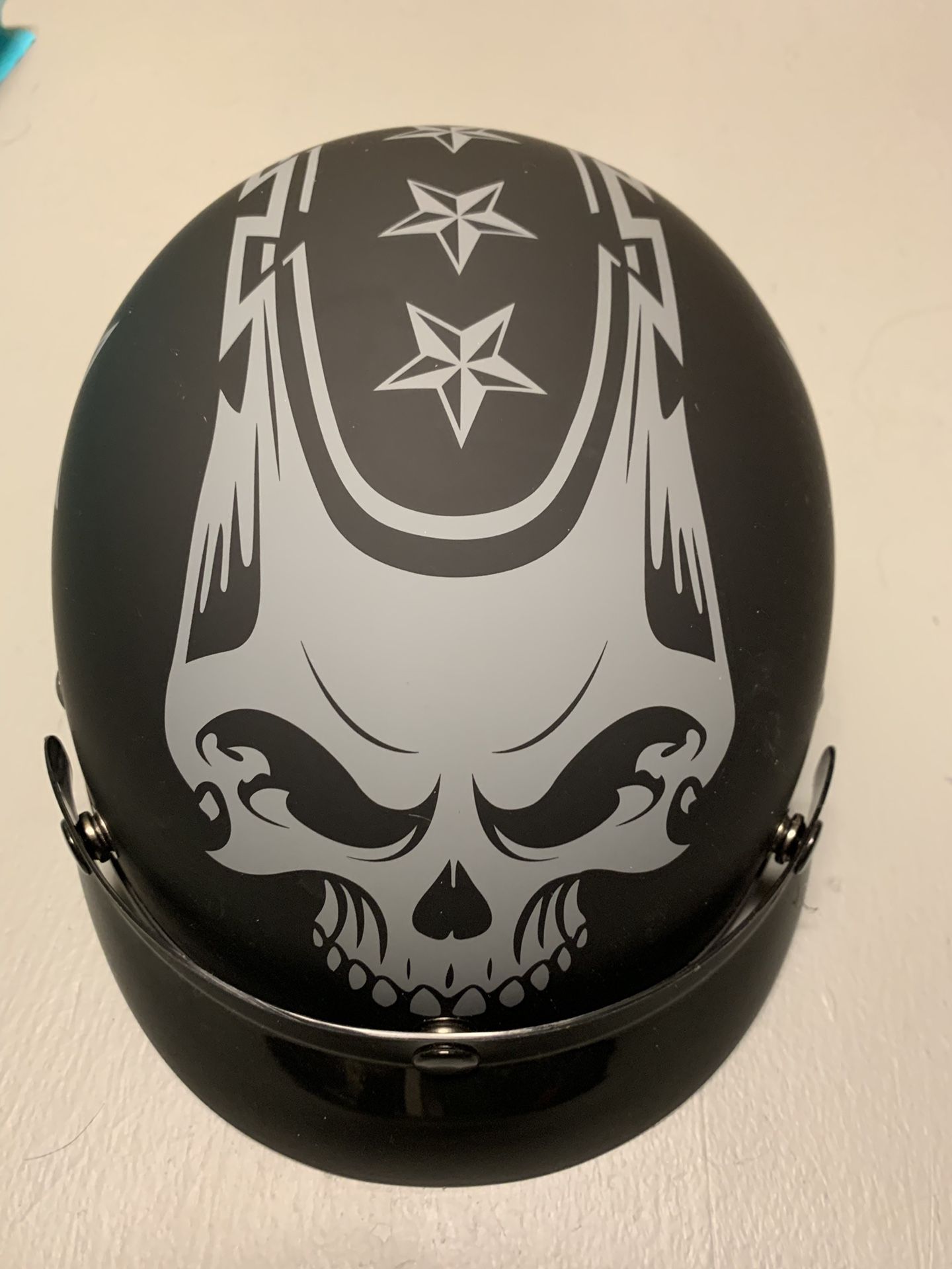 Half shell motorcycle helmet