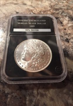 1889 genuine uncirculated Morgan silver dollar