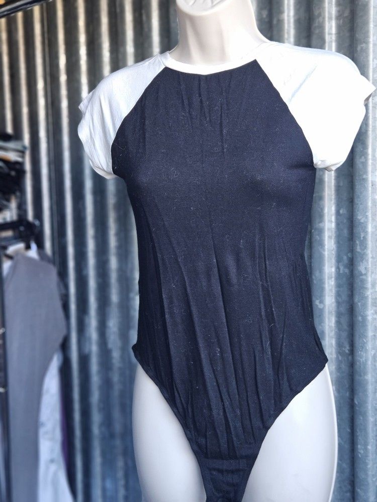 Set Of Small Bodysuits