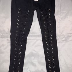 Black high-waisted lace-up eyelet pants