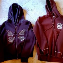 Two Brown Zip Up Hooded Jackets
