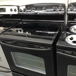 GE 4 Burner Glass Top Range. 1 year Warranty 