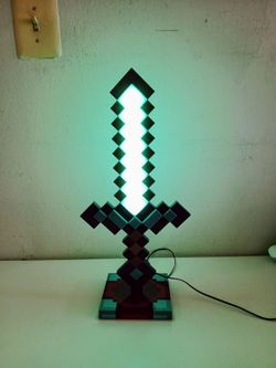 Amazing Minecraft Diamond Sword 14 Inch Desk LED Night Light.
Only 10 dollars.
And i gift a like New Genshin Impact Collection Fashion Acrylic Stand