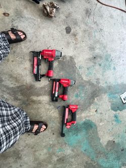 Pneumatic nailers and stapler