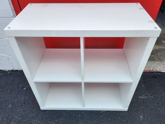 White four section cubicle