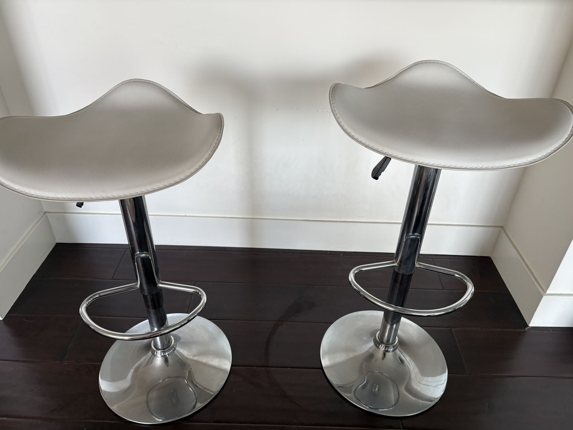 Pair of Leather Bar Stools — $140 (for both)