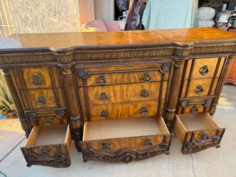 Ornate Wood Dresser with Multiple Drawers