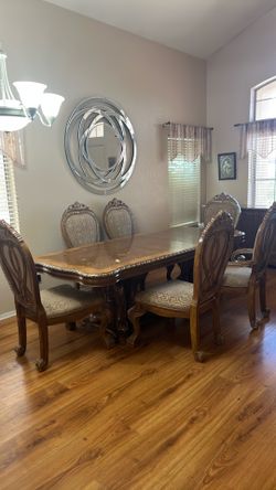 Table, 6 chairs, and buffet cabinets