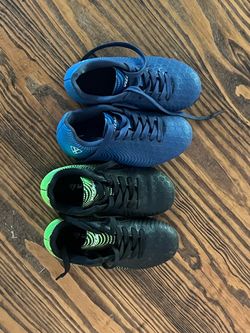 2 pairs of Cleats, toddler size 9.5