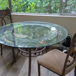 Glass dining table with chairs