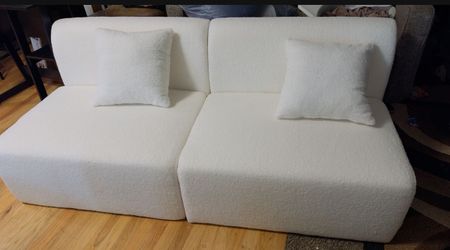 The sofa is new, but without legs and an armrest.