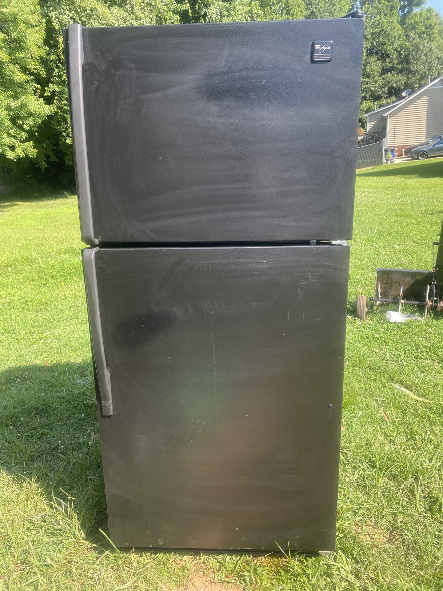 Black top and bottom refrigerator with ice works excellent issues $169.30 day warranty