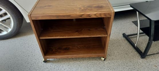Wooden shelf on wheels