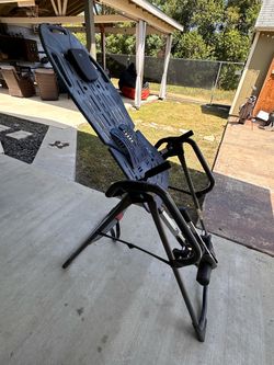 Teeter for back pain