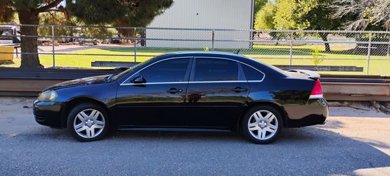 Impala 2012 color negro