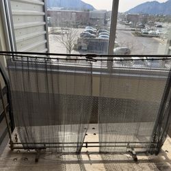 vintage brass and iron chainmail fireplace screen. 