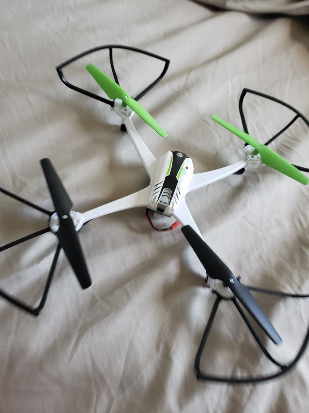 Green white Quadcopter gps Drone ups for grabs