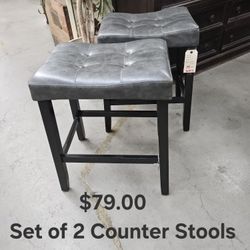 Gray SET OF 2 Counter StoolsWe are located at 2811 East Bell road. Another Time Around Furniture.
