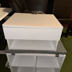 a white storage unit with a drawer on top and an open shelf below, pickup and cash $45