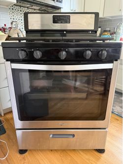 Whirlpool 5.1 cu ft freestanding gas range with speed heat burners
