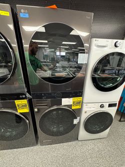 Graphite LG Washer 4.5 cu ft and 7.4 cu ft Gas Dryer Stacked Set. Units are new open box scratch and dent