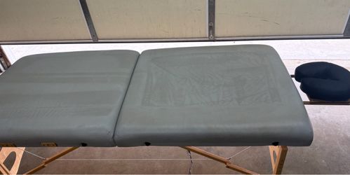 Portable folding massage table