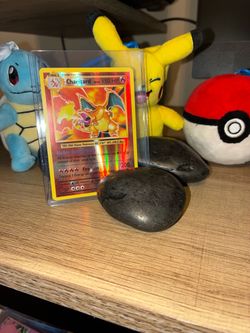 Charizard Holo Pokémon Card in Case