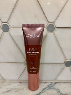 Tinted L'Oréal Paris Lumi Le Glow Tint fluid is shade 410 Cool. New/unopened. Gift-giving condition.