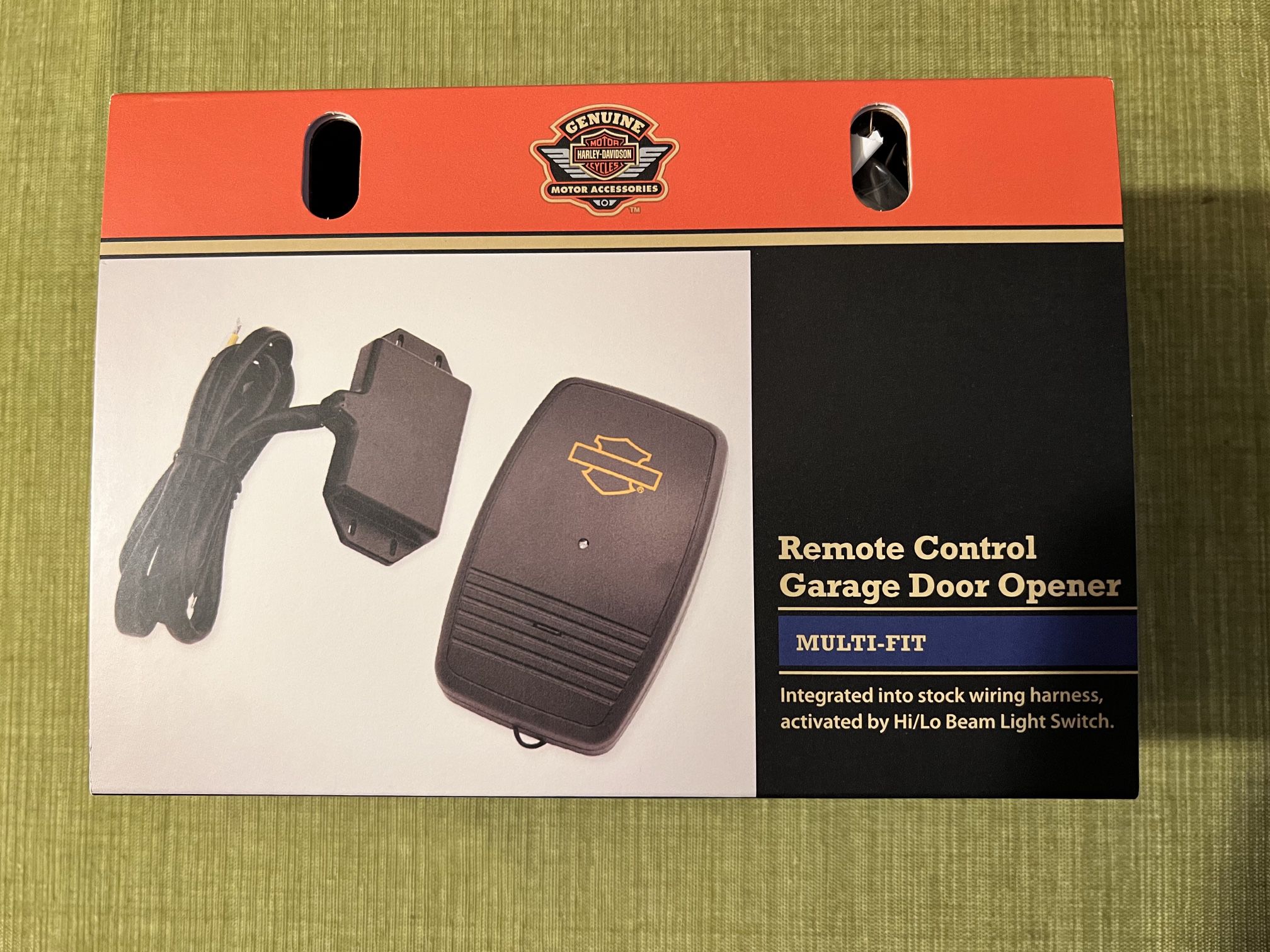 Harley Davidson remote control garage door opener. See photos for fitment. 