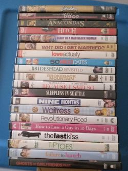 Twenty DVDS $18