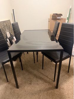 Glass top dining table set